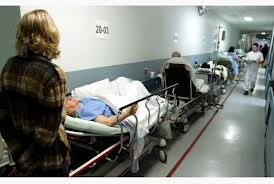 Typical in Quebec hospitals are stretchers lining the hallways due to overcrowding. 